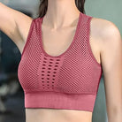 Damen Sport-BH aus atmungsaktivem Netzstoff in Rosa, ideal für Fitness und Yoga. Bequeme Passform, feuchtigkeitsableitend, stylisch.