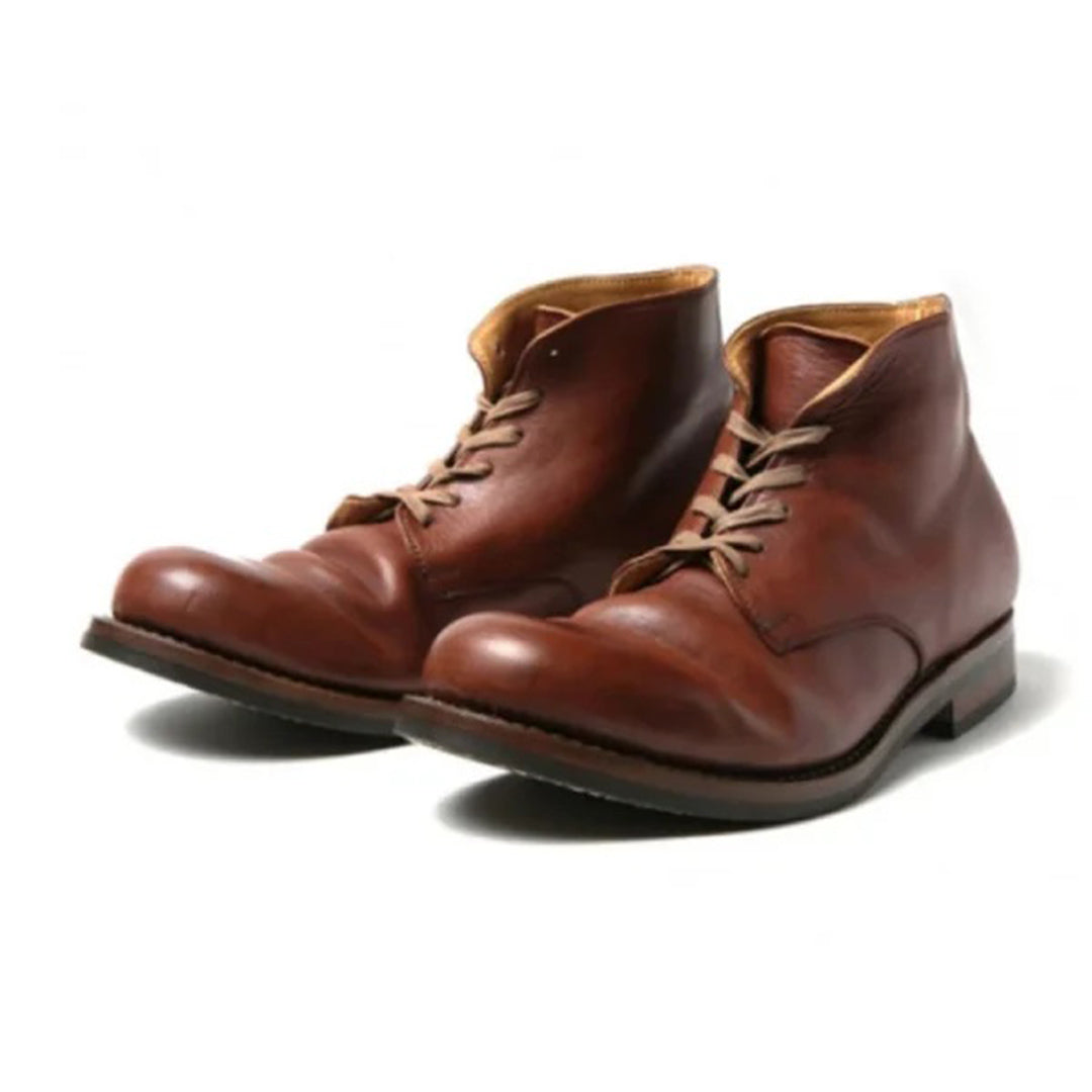 Braune Lederstiefel für Herren, handgefertigt, robustes Design, ideal für Herbstmode. Hochwertige Materialien, langlebig und stilvoll.