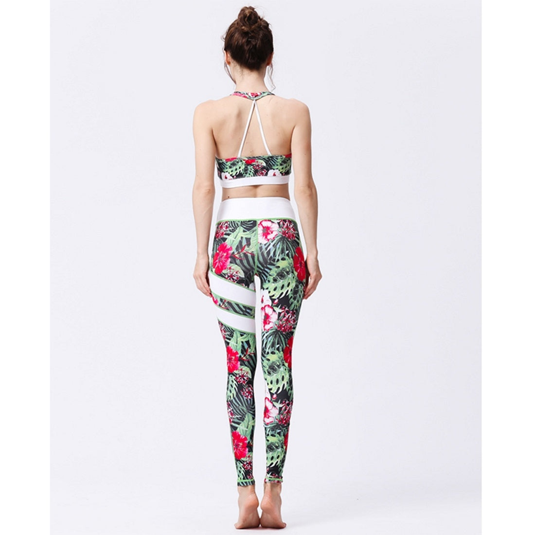 Damen-Sportbekleidung Set: Bunter Sport-BH und Leggings mit tropischem Blumenmuster, ideal für Yoga und Fitness. Atmungsaktiv und bequem.