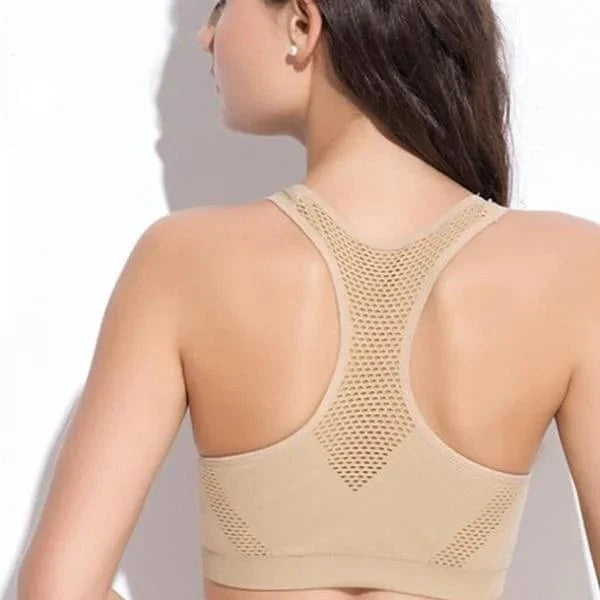 Atmungsaktiver Sport-BH in Beige, nahtloses Design, ideal für Fitness und Yoga. Komfort und Unterstützung für aktive Frauen.