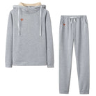 Graues Damen-Sportanzug-Set mit Kapuzenpullover und Jogginghose, ideal für Freizeit und Fitness. Bequem, modisch und vielseitig einsetzbar.